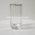 highball glass with gold rim